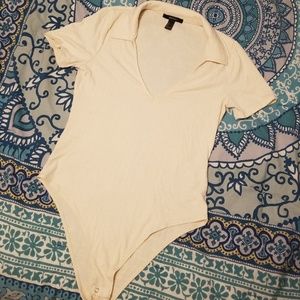 Cream colored bodysuit with collar